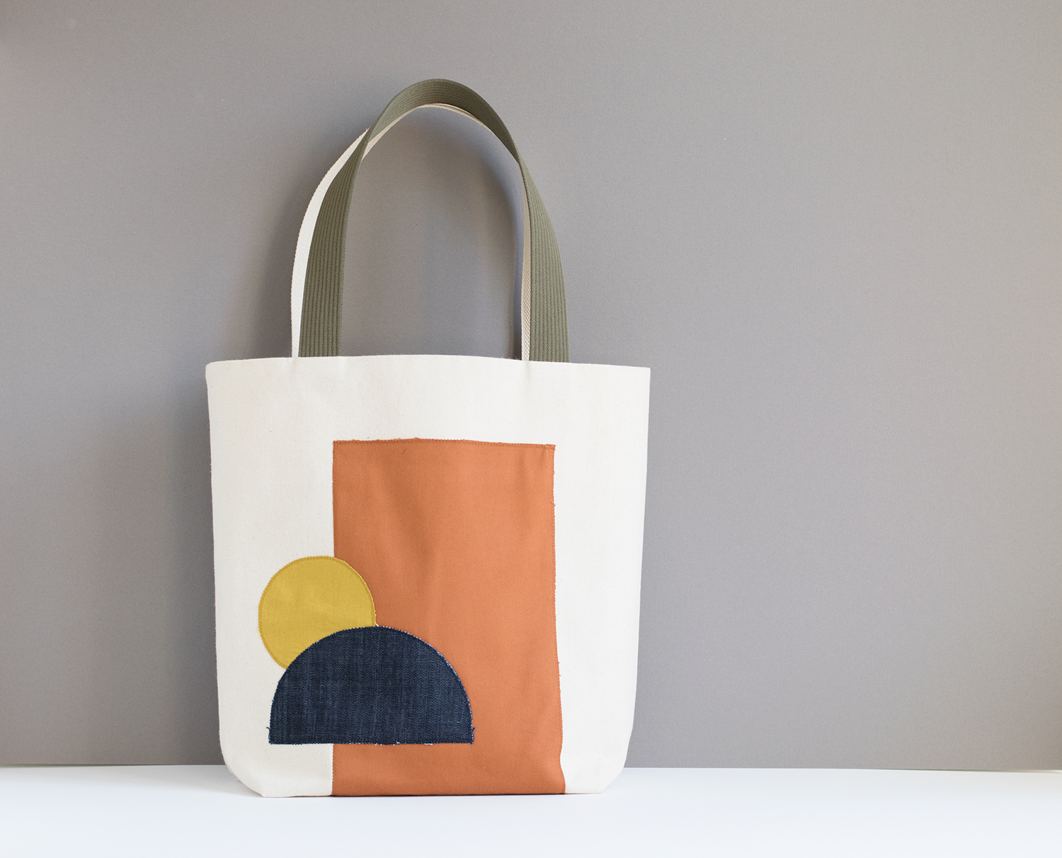 Geometric appliqué tote bag